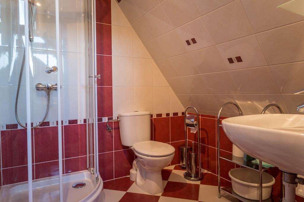 Sykowny Dworek Apartamenty コシチェリスコ 部屋 写真