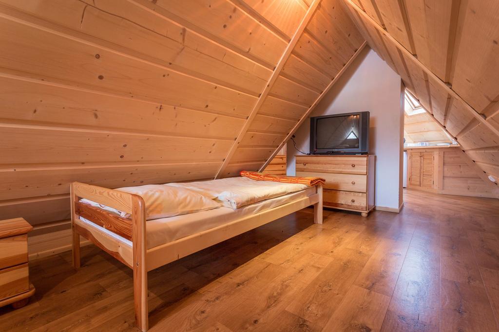 Sykowny Dworek Apartamenty コシチェリスコ 部屋 写真
