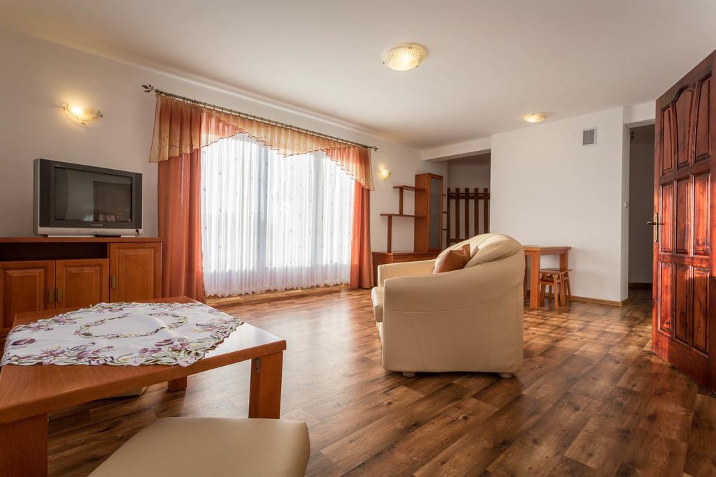 Sykowny Dworek Apartamenty コシチェリスコ 部屋 写真