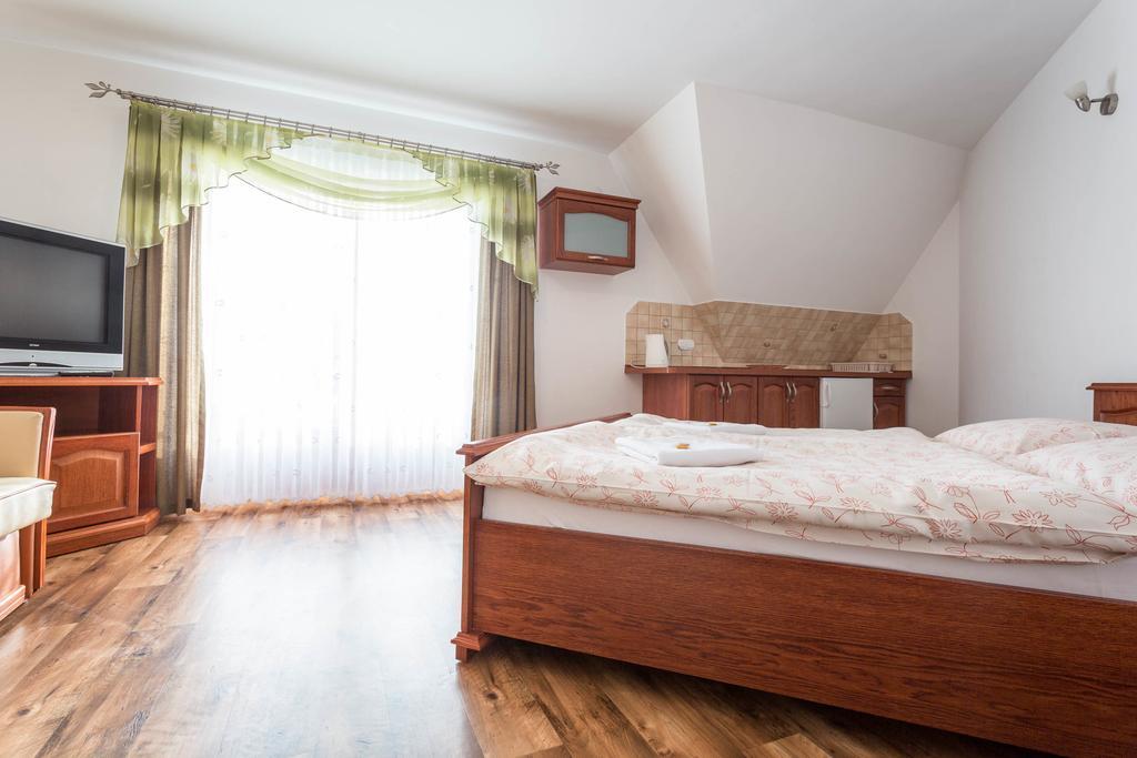 Sykowny Dworek Apartamenty コシチェリスコ 部屋 写真